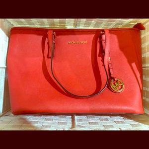 Michael Kors Jet set mandarin orange.